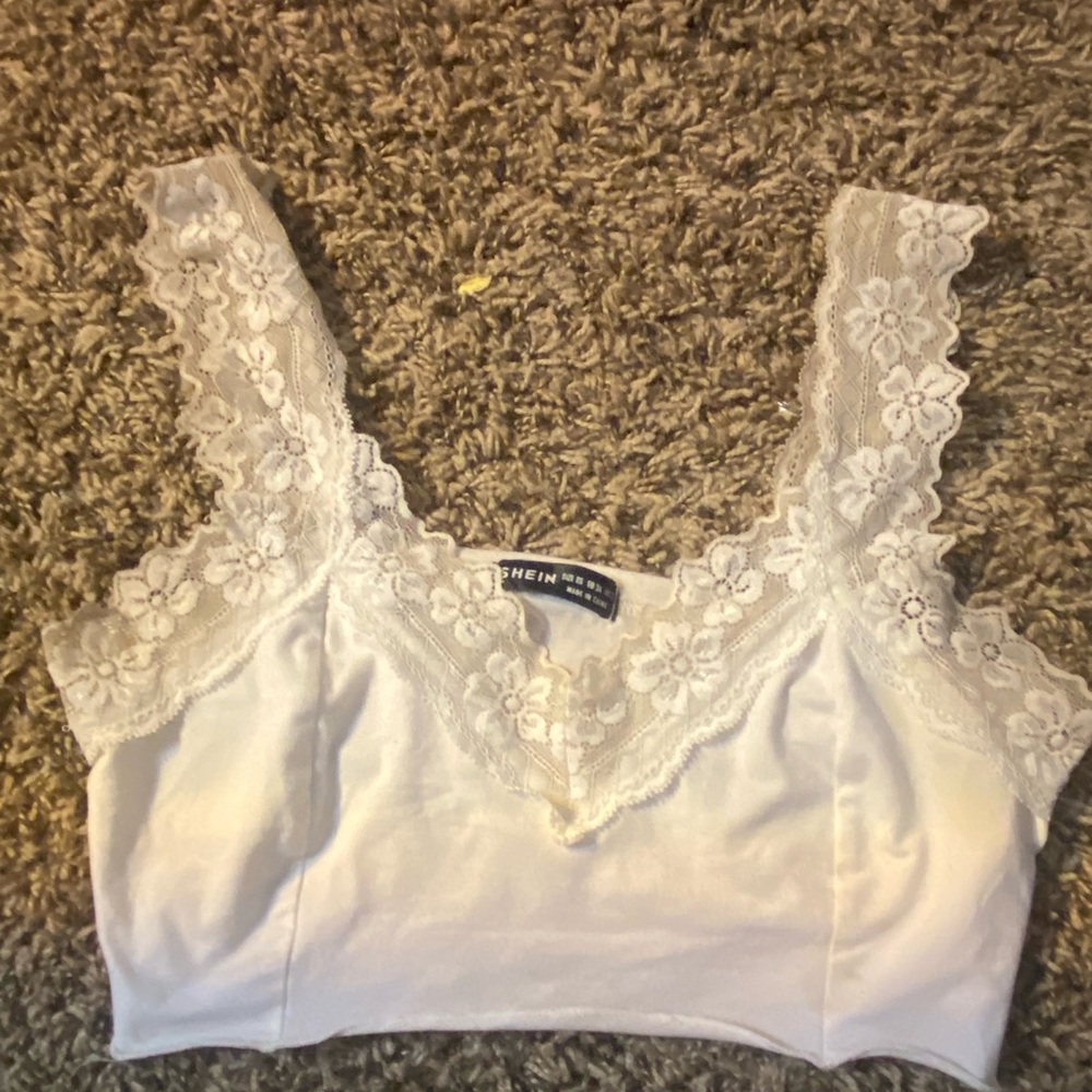 Small lace tank, fair condition, worn a few times.